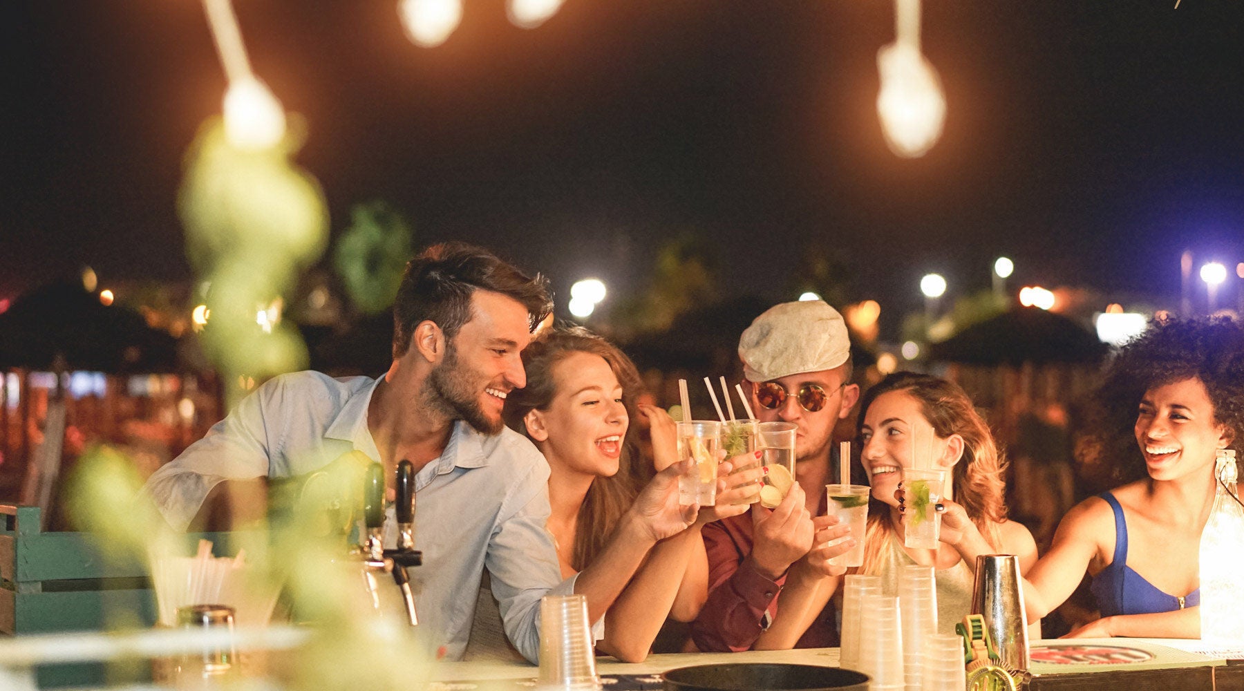 Group of friends drinking at a bar
